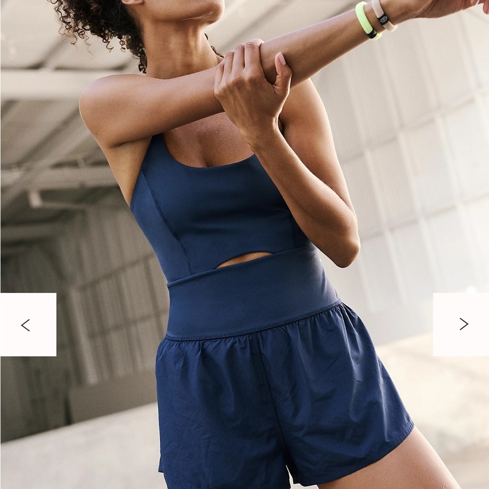 Free People Movement Righteous Runsie romper. NWT.